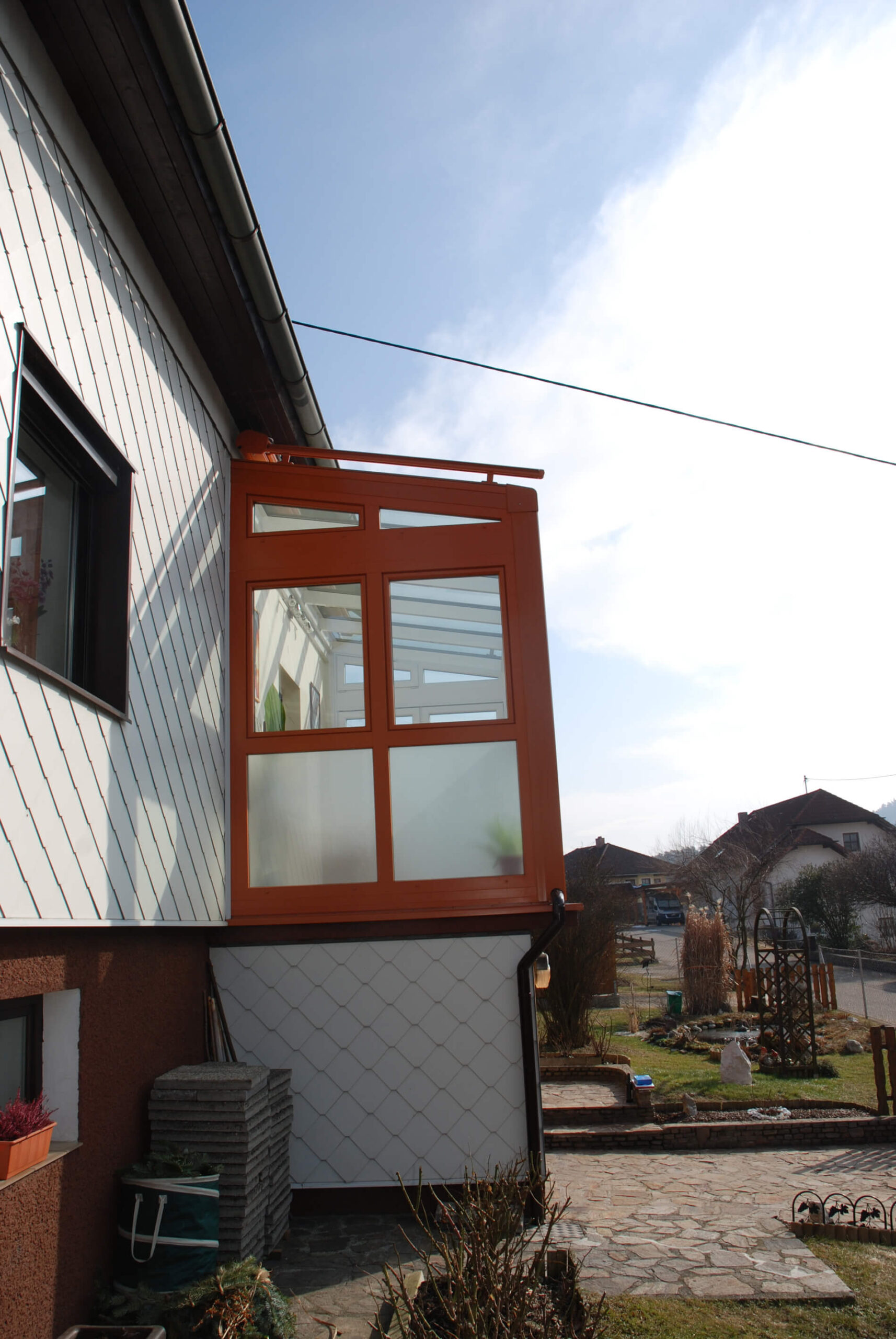 Wintergarten auf bestehenden Balkon montiert mit Dachglas